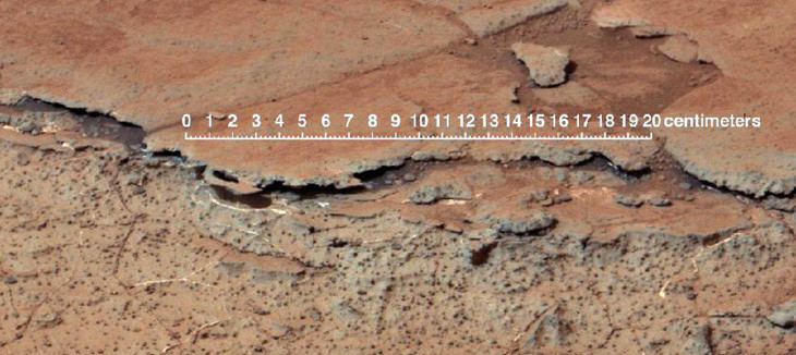 Earth-like soils on Mars? Ancient fossilized soils potentially found deep inside impact crater suggest microbial life